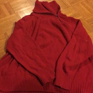 The red turtle neck sweater